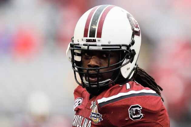 ORLANDO, FL - JANUARY 01:  Jadeveon Clowney #7 of the South Carolina Gamecocks works out on the field before the start of their game against the Wisconsin Badgers at the Capital One Bowl on January 1, 2014 in Orlando, Florida.  (Photo by Scott Halleran/Getty Images)