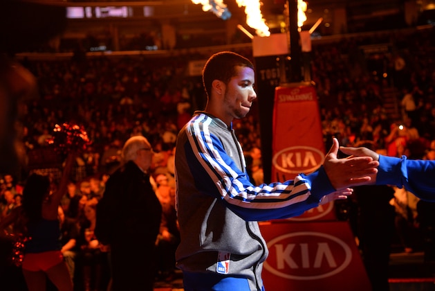 PHILADELPHIA, PA - MARCH 29: Michael Carter-Williams #1 of the Philadelphia 76ers is introduced before a game against the Detroit Pistons at the Wells Fargo Center on March 29, 2014 in Philadelphia, Pennsylvania. NOTE TO USER: User expressly acknowledges and agrees that, by downloading and or using this photograph, User is consenting to the terms and conditions of the Getty Images License Agreement. Mandatory Copyright Notice: Copyright 2014 NBAE (Photo by Jesse D. Garrabrant/NBAE via Getty Images)