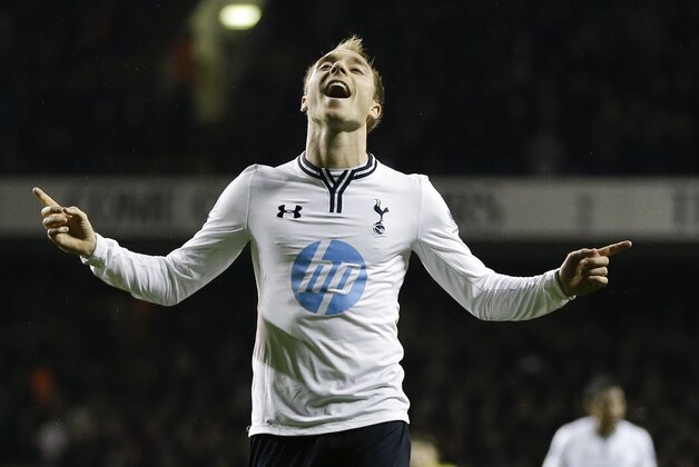 Tottenham's  Christian Eriksen celebrates scoring a goal during the English Premier League soccer match between Tottenham Hotspur and Sunderland at White Hart Lane stadium in London, Monday, April 7, 2014. (AP Photo/Kirsty Wigglesworth)