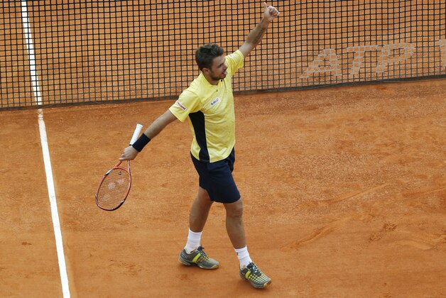Stanislas Wawrinka of Switzerland acknowledges applause after defeating Milos Raonic of Canada during their quarterfinals match of the Monte Carlo Tennis Masters tournament in Monaco, Friday, April 18, 2014. Wawrinka won 7-6 6-2. (AP Photo/Michel Euler) Stanislas Wawrinka of Switzerland acknowledges applause after defeating Milos Raonic of Canada during their quarterfinals match of the Monte Carlo Tennis Masters tournament in Monaco, Friday, April 18, 2014. Wawrinka won 7-6 6-2. (AP Photo/Michel Euler)