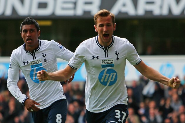 LONDON, ENGLAND - APRIL 19:  Harry Kane of Tottenham Hotspur celebrates scoring their second goal with Paulinho of Tottenham Hotspur during the Barclays Premier League match between Tottenham Hotspur and Fulham at White Hart Lane on April 19, 2014 in London, England.  (Photo by Clive Rose/Getty Images)