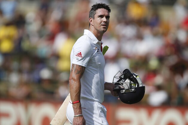 FILE- England's Kevin Pietersen walks back to the pavilion on the fourth day of their Ashes cricket Test match against Australia, in Perth, Australia, in this file photo dated Monday, Dec. 16, 2013.  Pietersen's England career appears to be over, it is announced Tuesday Feb. 4, 2013, after the brash batsman was not selected for the upcoming tour of West Indies.  Pietersen has attracted controversy during his playing career and accused of being a divisive influence within the England team, but he went on to play 104 Test matches, 136 one-day games and 37 Twenty20 fixtures for England. (AP Photo/Theron Kirkman, FILE)