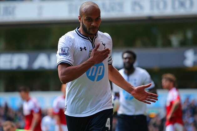 LONDON, ENGLAND - APRIL 19:  Younes Kaboul of Tottenham Hotspur celebrates scoring their third goal during the Barclays Premier League match between Tottenham Hotspur and Fulham at White Hart Lane on April 19, 2014 in London, England.  (Photo by Clive Rose/Getty Images)