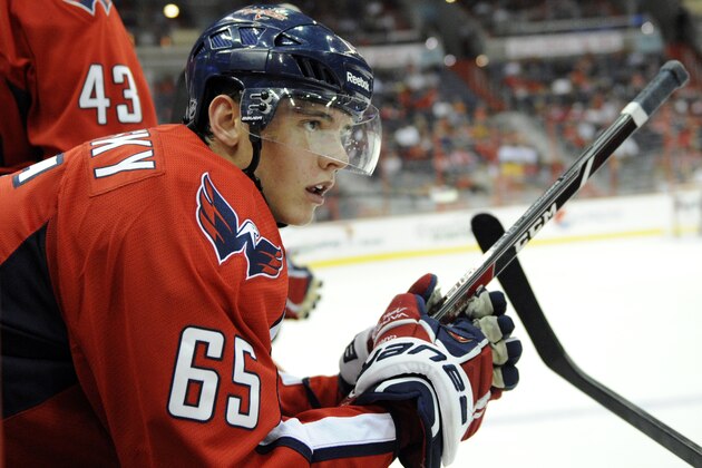 Washington Capitals left wing Andre Burakovsky (65), of Austria, looks on during the first period an NHL preseason hockey game against the Chicago Blackhawks, Friday, Sept. 20, 2013, in Washington. (AP Photo/Nick Wass)
