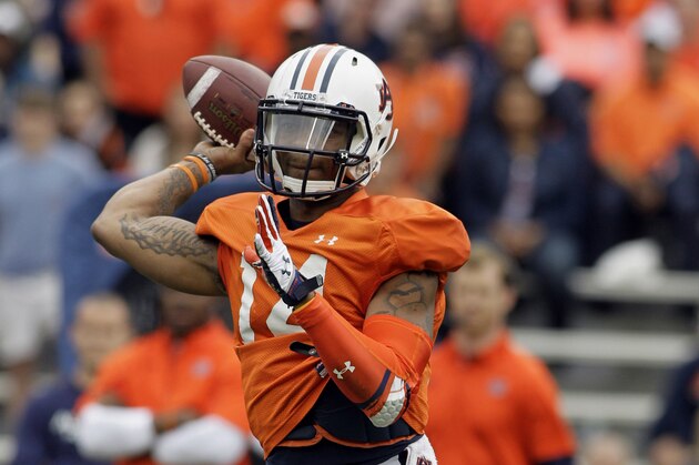 Apr 19, 2014; Auburn, AL, USA;  Auburn Tigers quarterback Nick Marshall (14) drops back to pass during the first half of the A-Day spring game at Jordan Hare Stadium. Mandatory Credit: John Reed-USA TODAY Sports