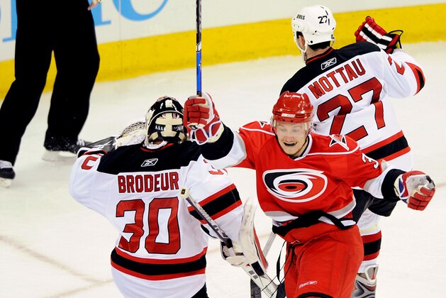RALEIGH, NC - APRIL 21:  Jussi Jokinen #36 of the Carolina Hurricanes celebrates after scoring the game-winning goal against Martin Brodeur #30 of the New Jersey Devils during Game Four of the Eastern Conference Quarterfinals of the 2009 Stanley Cup Playoffs on April 21, 2009 at the RBC Center in Raleigh, North Carolina.  (Photo by Grant Halverson/Getty Images)