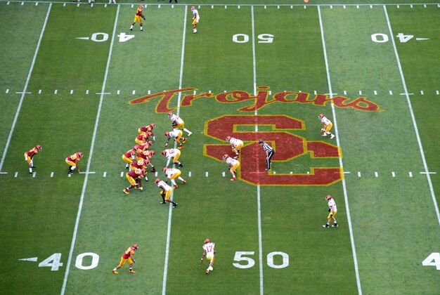 Apr 13, 2013; Los Angeles, CA, USA; General view of the Southern California Trojans spring game as quarterback Max Browne (4) takes the snap on the USC logo at midfield at the Los Angeles Memorial Coliseum. Mandatory Credit: Kirby Lee-USA TODAY Sports