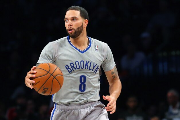 Apr 15, 2014; Brooklyn, NY, USA;  Brooklyn Nets guard Deron Williams (8) advances the ball during the third quarter against the New York Knicks at Barclays Center. New York Knicks won 109-98.  Mandatory Credit: Anthony Gruppuso-USA TODAY Sports