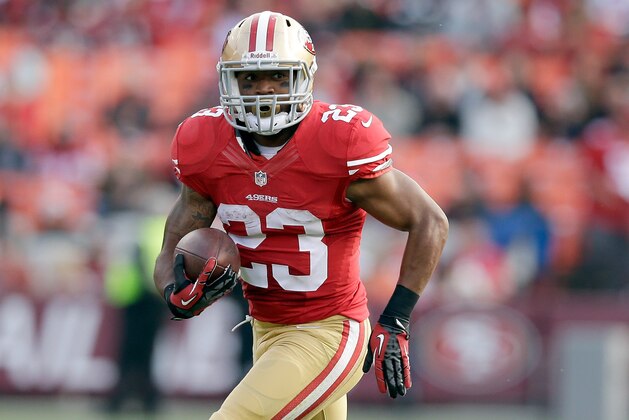 SAN FRANCISCO, CA - AUGUST 08:  LaMichael James #23 of the San Francisco 49ers runs with the ball during their preseason NFL game against the Denver Broncos at Candlestick Park on August 8, 2013 in San Francisco, California.  (Photo by Ezra Shaw/Getty Images)