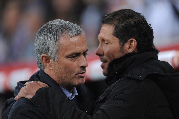 MADRID, SPAIN - MAY 17:  Head coach Jose Mourinho (L) of Real Madrid greets Head coach Diego Simeone of Atletico de Madrid before the start of the Copa del Rey Final between Real Madrid CF and Club Atletico de Madrid at Estadio Santiago Bernabeu on May 17, 2013 in Madrid, Spain.  (Photo by Denis Doyle/Getty Images)