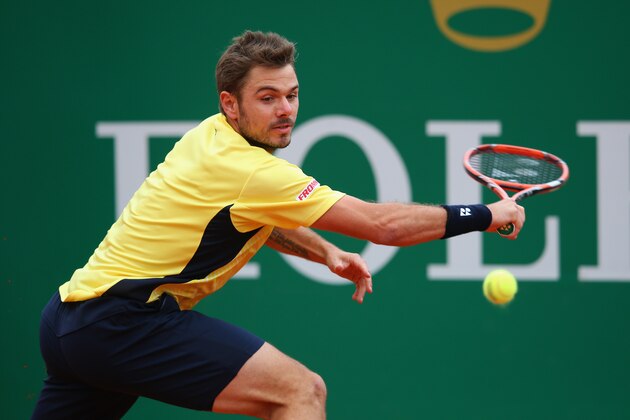 MONTE-CARLO, MONACO - APRIL 20:  Stanislas Wawrinka of Switzerland in action against Roger Federer of Switzerland in the final during day eight of the ATP Monte Carlo Rolex Masters Tennis at Monte-Carlo Sporting Club on April 20, 2014 in Monte-Carlo, Monaco.  (Photo by Julian Finney/Getty Images)