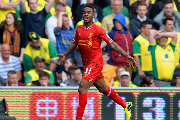 NORWICH, ENGLAND - APRIL 20:  Raheem Sterling of Liverpool celebrates scoring their third goal during the Barclays Premier League match between Norwich City and Liverpool at Carrow Road on April 20, 2014 in Norwich, England.  (Photo by Michael Regan/Getty Images)