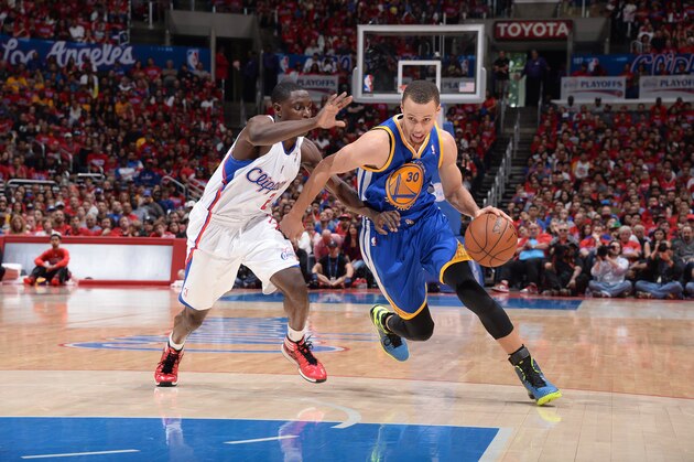 LOS ANGELES, CA - APRIL 19: Stephen Curry #30 of the Golden State Warriors drives to the basket during Game One of the Western Conference Quarterfinals of the NBA Playoffs against the Golden State Warriors at STAPLES Center on April 19, 2014 in Los Angeles, California. NOTE TO USER: User expressly acknowledges and agrees that, by downloading and/or using this Photograph, user is consenting to the terms and conditions of the Getty Images License Agreement. Mandatory Copyright Notice: Copyright 2014 NBAE (Photo by Andrew D. Bernstein/NBAE via Getty Images)