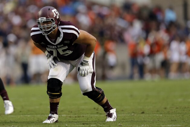 Texas A&M offensive linesman Jake Matthews lines up against Sam Houston State during the second quarter of an NCAA college football game Saturday, Sept. 7, 2013, in College Station, Texas. (AP Photo/David J. Phillip)