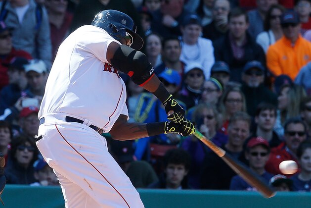 BOSTON, MA - APRIL 19: David Ortiz #34 of the Boston Red Sox connects for a homerun in the fourth inning against the Baltimore Orioles at Fenway Park on April 19, 2014 in Boston, Massachusetts.  (Photo by Jim Rogash/Getty Images)
