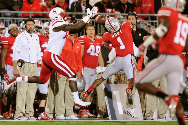 COLUMBUS, OH - OCTOBER 6:  Bradley Roby #1 of the Ohio State Buckeyes steps in front of Quincy Enunwa #18 of the Nebraska Cornhuskers to intercept a pass at Ohio Stadium on October 6, 2012 in Columbus, Ohio. Roby returned the interception 40 yards for a touchdown in the first quarter.  (Photo by Jamie Sabau/Getty Images)