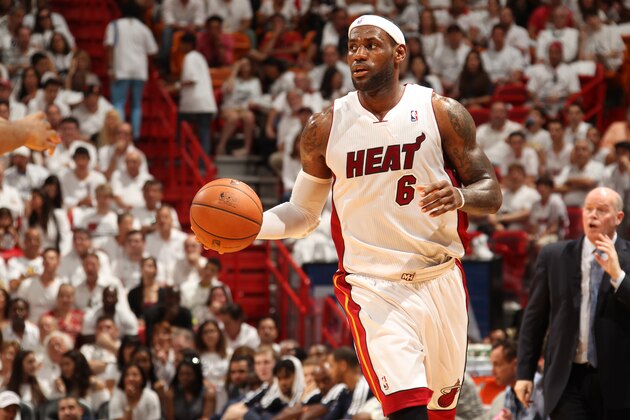 MIAMI, FL - April 20: LeBron James #6 of the Miami Heat handles the ball against the Charlotte Bobcats during Game One of the Eastern Conference Quarterfinals of the 2014 NBA playoffs at the American Airlines Arena in Miami, Florida on April 20, 2014. NOTE TO USER: User expressly acknowledges and agrees that, by downloading and/or using this photograph, user is consenting to the terms and conditions of the Getty Images License Agreement. Mandatory copyright notice: Copyright NBAE 2014 (Photo by Issac Baldizon/NBAE via Getty Images)