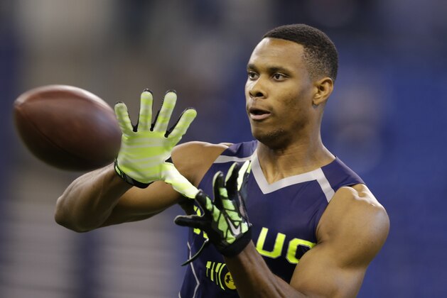 Vanderbilt wide receiver Jordan Matthews makes a catch during a drill at the NFL football scouting combine in Indianapolis, Sunday, Feb. 23, 2014. (AP Photo/Michael Conroy)