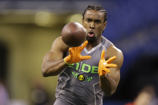 Virginia Tech defensive back Antone Exum runs a drill at the NFL football scouting combine in Indianapolis, Tuesday, Feb. 25, 2014. (AP Photo/Michael Conroy)