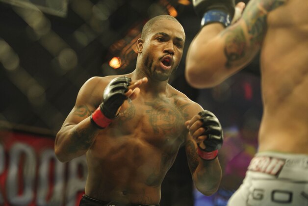 Nov 6, 2013; Fort Campbell, KY, USA; Bobby Green (red gloves) fights James Krause (blue gloves) in the lightweight bout during UFC Fight for the Troops at Fort Campbell. Mandatory Credit: Joshua Lindsey-USA TODAY Sports