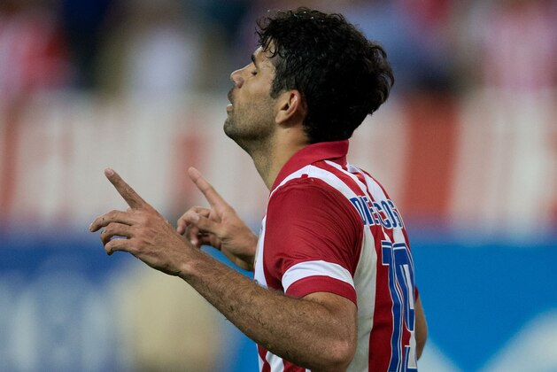 MADRID, SPAIN - APRIL 18:  Diego Costa of Atletico de Madrid celebrates scoring their second goal during the La Liga match between Club Atletico de Madrid and Elche FC at Vicente Calderon Stadium on April 18, 2014 in Madrid, Spain.  (Photo by Gonzalo Arroyo Moreno/Getty Images)