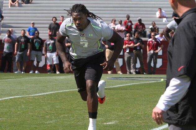 South Carolina defensive end Jadeveon Clowney competes in a drill for NFL representatives at South Carolina football pro day in Columbia, S.C., Wednesday, April 2, 2014. (AP Photo/Mary Ann Chastain)