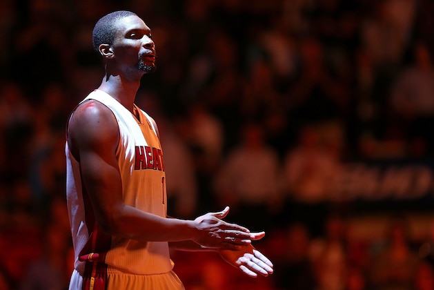 MIAMI, FL - MARCH 12:  Chris Bosh #1 of the Miami Heat looks on during a game against the Brooklyn Nets at American Airlines Arena on March 12, 2014 in Miami, Florida. NOTE TO USER: User expressly acknowledges and agrees that, by downloading and/or using this photograph, user is consenting to the terms and conditions of the Getty Images License Agreement. Mandatory copyright notice:  (Photo by Mike Ehrmann/Getty Images)