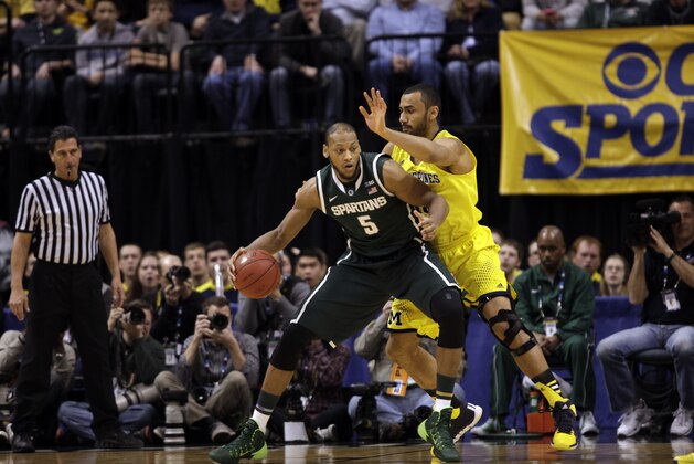 Michigan State forward Adreian Payne drives against Michigan forward Jon Horford in the first half of an NCAA college basketball game in the championship of the Big Ten Conference tournament Sunday, March 16, 2014, in Indianapolis. (AP Photo/Kiichiro Sato) Michigan State forward Adreian Payne drives against Michigan forward Jon Horford in the first half of an NCAA college basketball game in the championship of the Big Ten Conference tournament Sunday, March 16, 2014, in Indianapolis. (AP Photo/Kiichiro Sato)