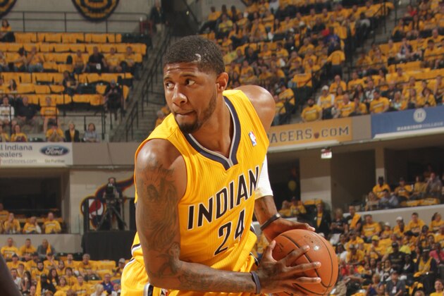INDIANAPOLIS - APRIL 19: Paul George #24 of the Indiana Pacers looks to pass the ball against the Atlanta Hawks in the East Conference Quarter Finals at Bankers Life Fieldhouse on April 19, 2014 in Indianapolis, Indiana.  NOTE TO USER: User expressly acknowledges and agrees that, by downloading and or using this Photograph, user is consenting to the terms and condition of the Getty Images License Agreement. Mandatory Copyright Notice: 2014 NBAE  (Photo by Ron Hoskins/NBAE via Getty Images)