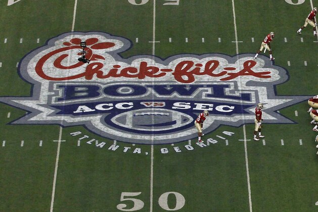 Auburn kicker Chandler Brooks (29) runs past the official Chick-fil-A Bowl logo at midfield during an NCAA football practice at the Georgia Dome on Tuesday, Dec. 27, 2011, in Atlanta. Virginia will face Auburn for the 44th annual Chick-fil-A Bowl on Saturday, Dec. 31, 2011. (AP Photo/David Tulis) Auburn kicker Chandler Brooks (29) runs past the official Chick-fil-A Bowl logo at midfield during an NCAA football practice at the Georgia Dome on Tuesday, Dec. 27, 2011, in Atlanta. Virginia will face Auburn for the 44th annual Chick-fil-A Bowl on Saturday, Dec. 31, 2011. (AP Photo/David Tulis)