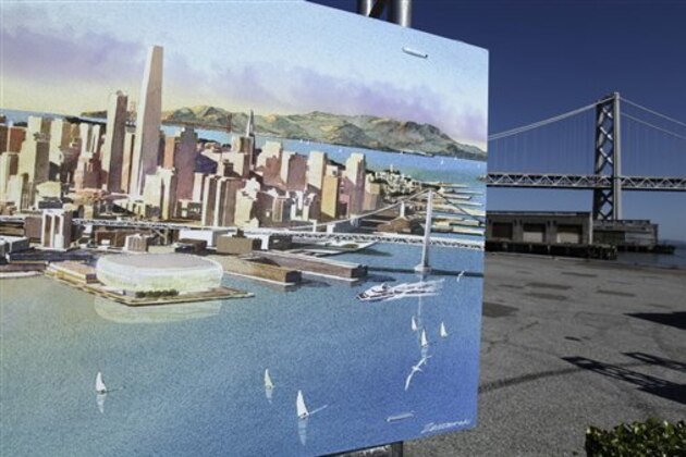 An artists sketch showing the Golden State Warriors proposed new basketball arena is displayed with the San Francisco-Oakland Bay Bridge in the background in San Francisco, Tuesday, May 22, 2012. The Warriors unveiled plans to build an arena at Piers 30-32. The waterfront site  is just blocks from the San Francisco Giants' ballpark and the downtown financial district. The arena is expected to be completed by 2017. (AP Photo/Eric Risberg)
