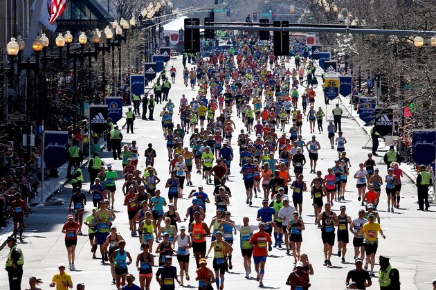 BOSTON, MA - APRIL 21:  Runners approach the finish line of the 118th Boston Marathon on April 21, 2014 in Boston, Massachusetts.  (Photo by Jim Rogash/Getty Images)
