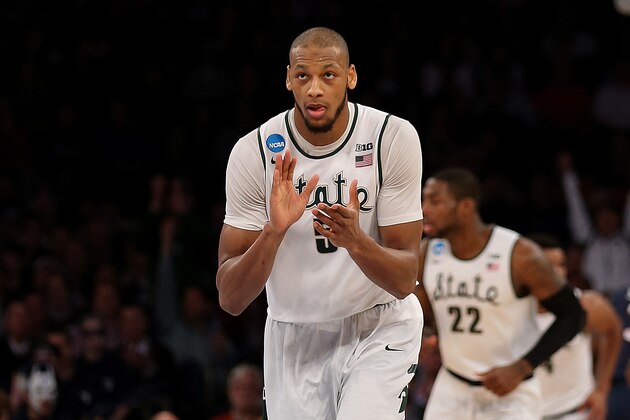 NEW YORK, NY - MARCH 30:  Adreian Payne #5 of the Michigan State Spartans reacts after a basket against the Connecticut Huskies during the East Regional Final of the 2014 NCAA Men's Basketball Tournament at Madison Square Garden on March 30, 2014 in New York City.  (Photo by Bruce Bennett/Getty Images)