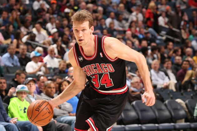 CHARLOTTE, NC - APRIL 16:  Mike Dunleavy #34 of the Chicago Bulls drives against the Charlotte Bobcats during the game at the Time Warner Cable Arena on April 16, 2014 in Charlotte, North Carolina. NOTE TO USER: User expressly acknowledges and agrees that, by downloading and or using this photograph, User is consenting to the terms and conditions of the Getty Images License Agreement.  Mandatory Copyright Notice:  Copyright 2014 NBAE (Photo by Brock Williams-Smith/NBAE via Getty Images)