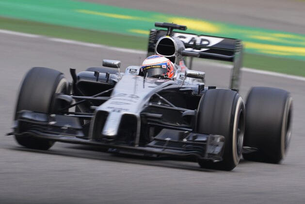 SHANGHAI, CHINA - APRIL 20:  Jenson Button of Great Britain and McLaren drives during the Chinese Formula One Grand Prix at the Shanghai International Circuit on April 20, 2014 in Shanghai, China.  (Photo by Lars Baron/Getty Images)
