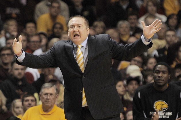 Southern Mississippi coach Donnie Tyndall yells at his team during the second half against Minnesota in an NCAA college basketball game in the third round of the National Invitational Tournament in Minneapolis, Tuesday, March 25, 2014. Minnesota won 81-73.(AP Photo/Tom Olmscheid)