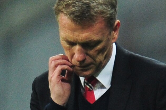 MUNICH, GERMANY - APRIL 09:  David Moyes, manager of Manchester United looks dejected during the UEFA Champions League Quarter Final second leg match between FC Bayern Muenchen and Manchester United at Allianz Arena on April 9, 2014 in Munich, Germany.  (Photo by Shaun Botterill/Getty Images)