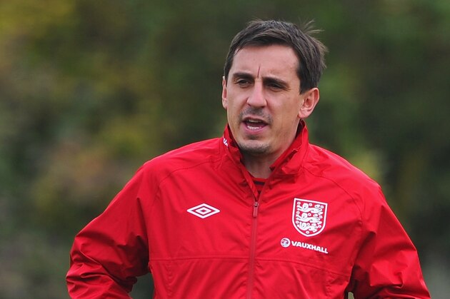 ST ALBANS, ENGLAND - OCTOBER 11: Assistant coach Gary Neville looks on during the England training session ahead of their FIFA World Cup qualifier against San Marino at London Colney on October 11, 2012 in St Albans, England.  (Photo by Michael Regan/Getty Images)