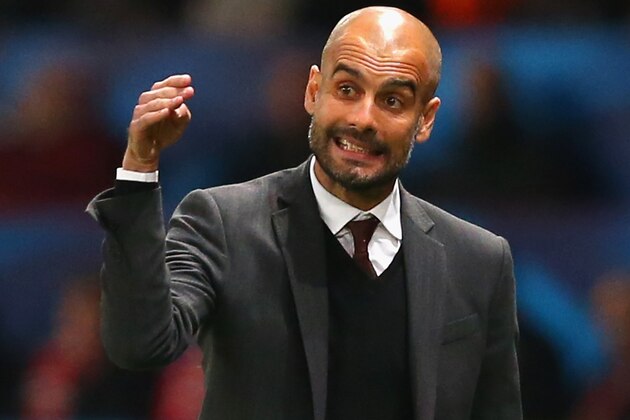 MANCHESTER, ENGLAND - APRIL 01:  Pep Guardiola head coach of Bayern Muenchen gives intructions during the UEFA Champions League Quarter Final first leg match between Manchester United and FC Bayern Muenchen at Old Trafford on April 1, 2014 in Manchester, England.  (Photo by Alex Livesey/Getty Images)