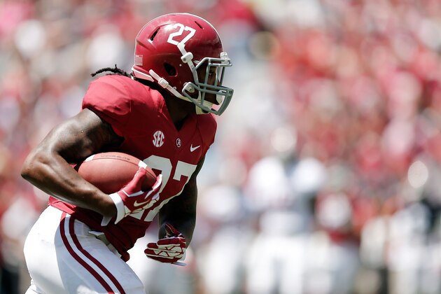 TUSCALOOSA, AL - APRIL 19:  Derrick Henry #27 of the Crimson team runs for yards against the White team during the University of Alabama A-Day spring game at Bryant-Denny Stadium on April 19, 2014 in Tuscaloosa, Alabama.  (Photo by Stacy Revere/Getty Images)