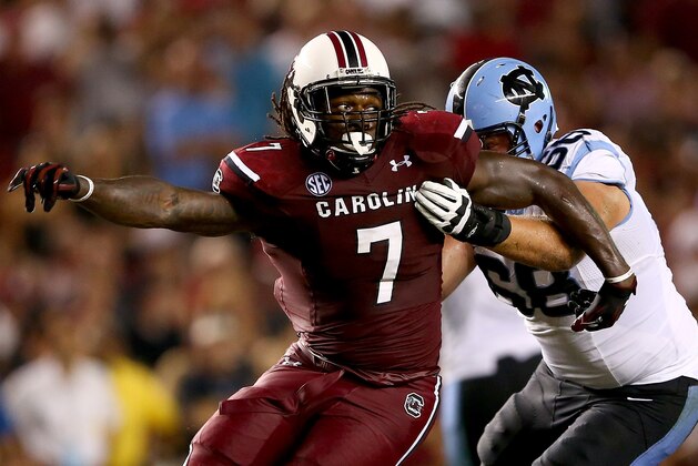 COLUMBIA, SC - AUGUST 29:  Jadeveon Clowney #7 of the South Carolina Gamecocks goes past James Hurst #68 of the North Carolina Tar Heels during their game at Williams-Brice Stadium on August 29, 2013 in Columbia, South Carolina.  (Photo by Streeter Lecka/Getty Images)