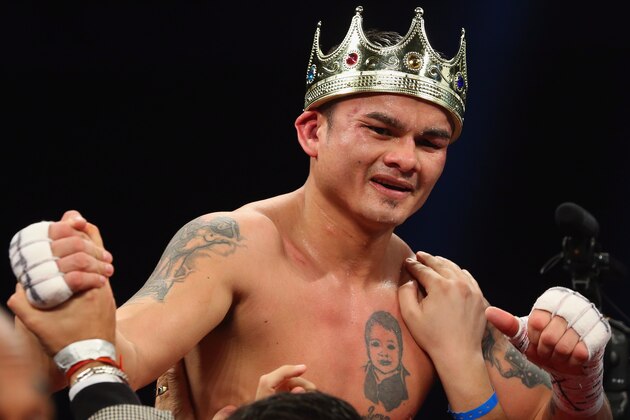 SAN ANTONIO, TX - DECEMBER 14:  Marcos Maidana celebrates his unanimous decision against Adrien Broner becoming the new WBA Welterweight Title champion at Alamodome on December14, 2013 in San Antonio, Texas.during their bout at Alamodome on December 14, 2013 in San Antonio, Texas.  (Photo by Ronald Martinez/Getty Images)