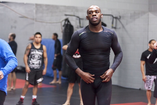 ALBUQUERQUE, NM - APRIL 2: UFC lightweight champion Jon 'Bones' Jones joins in for a warm up during an open training session for fans and media at the Jackson's Mixed Martial Arts and Fitness on April 2, 2014 in Albuquerque, New Mexico. (Photo by Aaron Sweet/Getty Images)