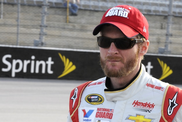 Dale Earnhardt Jr walks down pit road before qualifying for a NASCAR Sprint Cup series auto race at Darlington Speedway in Darlington, S.C., Friday, April 11, 2014. (AP Photo/Mike McCarn) Dale Earnhardt Jr walks down pit road before qualifying for a NASCAR Sprint Cup series auto race at Darlington Speedway in Darlington, S.C., Friday, April 11, 2014. (AP Photo/Mike McCarn)