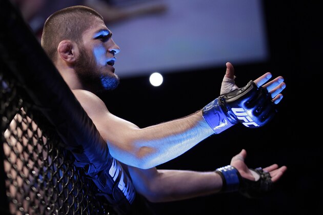 Khabib Nurmagomedov, from Russia, celebrates after Thiago Tavares, from Brazil,  during their lightweight mixed martial arts bout at the Ultimate Fighting Championship (UFC) in Sao Paulo, Brazil, Saturday, Jan. 19, 2013. (AP Photo/Andre Penner)