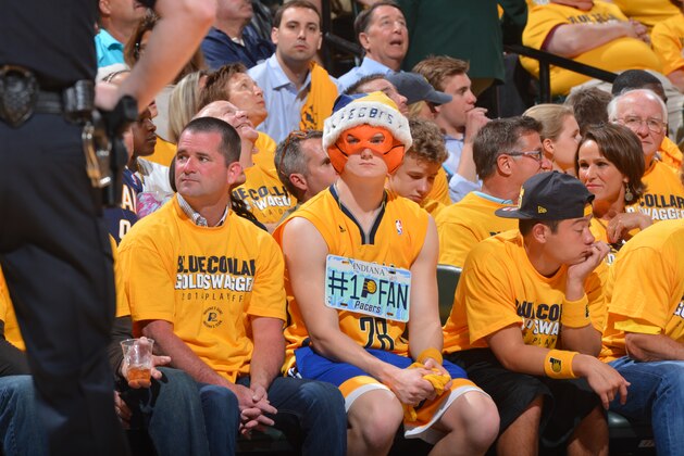 INDIANAPOLIS, IN - APRIL 19:  Indiana Pacers fans cheer during Game One of the Eastern Conference Quarterfinals against the Atlanta Hawks during the 2014 NBA Playoffs on April 19, 2014 at Bankers Life Fieldhouse in Indianapolis, Indiana. NOTE TO USER: User expressly acknowledges and agrees that, by downloading and or using this photograph, User is consenting to the terms and conditions of the Getty Images License Agreement. Mandatory Copyright Notice: Copyright 2014 NBAE (Photo by Jesse D. Garrabrant/NBAE via Getty Images)
