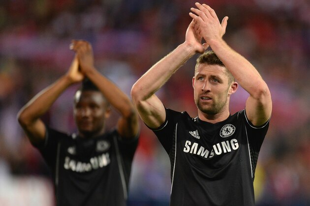 MADRID, SPAIN - APRIL 22:  Gary Cahill of Chelsea applauds the fans at the final whistle during the UEFA Champions League Semi Final first leg match between Club Atletico de Madrid and Chelsea at Vicente Calderon Stadium on April 22, 2014 in Madrid, Spain.  (Photo by Mike Hewitt/Getty Images)