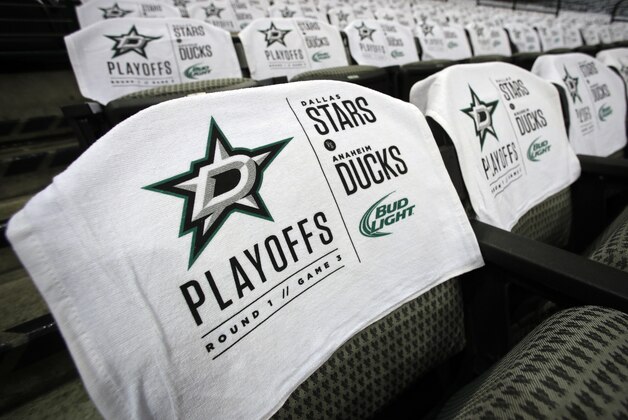Rally towels hang over seats throughout the American Airlines Center before a first-round NHL hockey Stanley Cup playoff series game between the Anaheim Ducks and Dallas Stars, Monday, April 21, 2014, in Dallas. (AP Photo/Tony Gutierrez)
