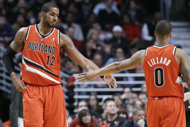 Portland Trail Blazers forward LaMarcus Aldridge, left, celebrates with guard Damian Lillard after scoring a basket during the second half of an NBA basketball game against the Chicago Bulls in Chicago on Thursday, March 21, 2013. The Trail Blazers won 99-89. (AP Photo/Nam Y. Huh) Portland Trail Blazers forward LaMarcus Aldridge, left, celebrates with guard Damian Lillard after scoring a basket during the second half of an NBA basketball game against the Chicago Bulls in Chicago on Thursday, March 21, 2013. The Trail Blazers won 99-89. (AP Photo/Nam Y. Huh)