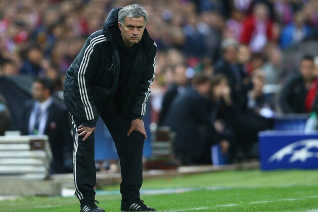 MADRID, SPAIN - APRIL 22:  Manager Jose Mourinho of Chelsea looks on from the dug out during the UEFA Champions League Semi Final first leg match between Club Atletico de Madrid and Chelsea at Vicente Calderon Stadium on April 22, 2014 in Madrid, Spain.  (Photo by Paul Gilham/Getty Images)